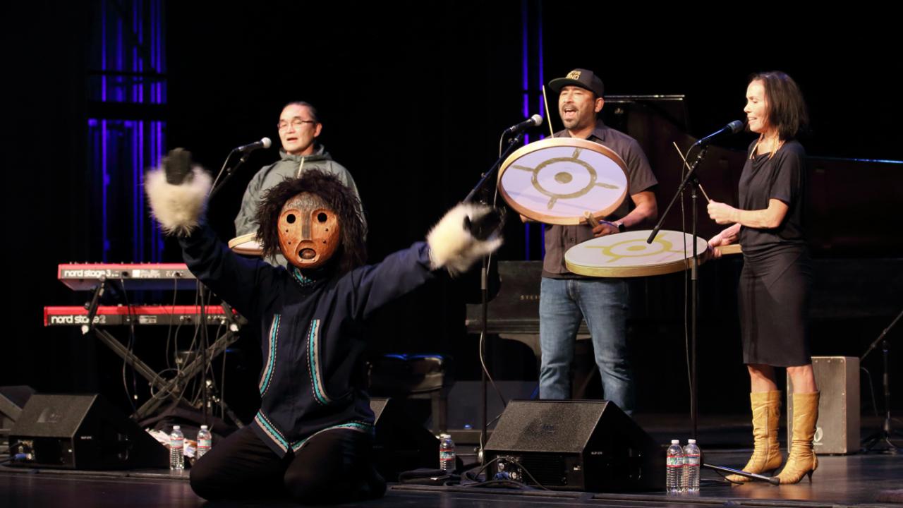 Pamyua performers with puppet and drum